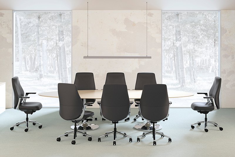 Unity 6961 mid back executive conference chair around a table in a boardroom
