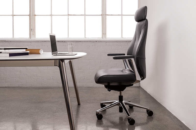 Unitiy 6972 high back executive conference chair at a desk