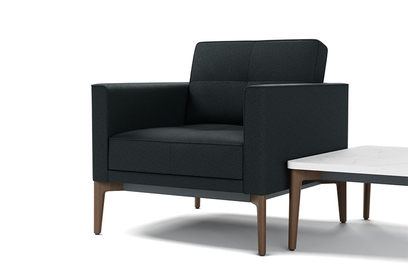 Symm lounge chair with the Symm rectangle occasional table
