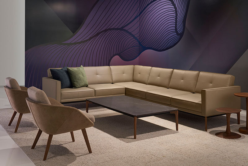Symm modular sofa with the Symm rectangle occasional table and two Symm low back lounge chairs