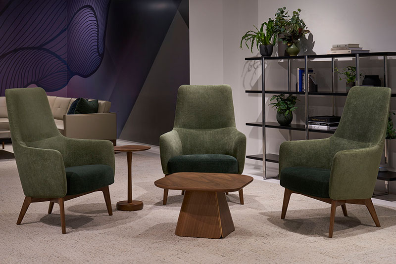 Three Neesh lounge chairs around the Fold square occasional table