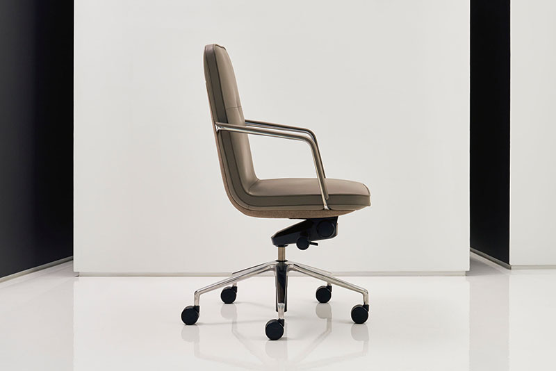 Side view of the Swav mid back conference chair on white background